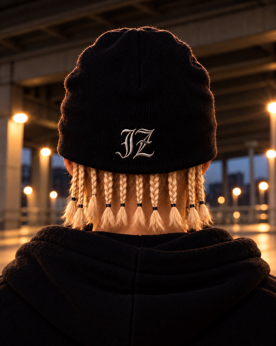 Model wearing the MOON Beanie, back view showing the JZ embroidery