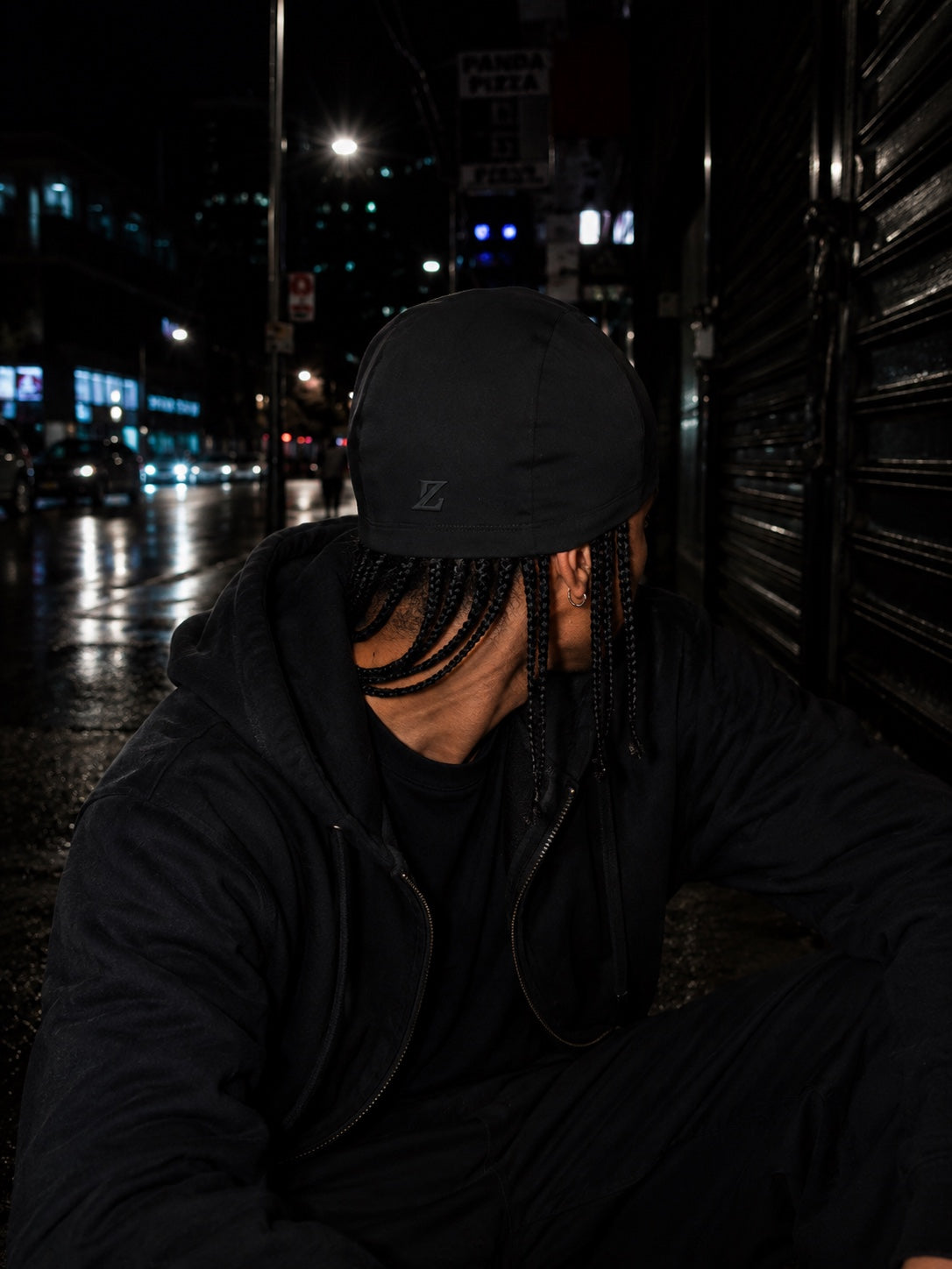 Model wearing the JOHZZEE Skull Cap, back view